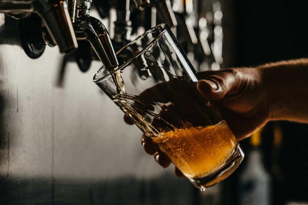Shreveport brweries tap beer in glass